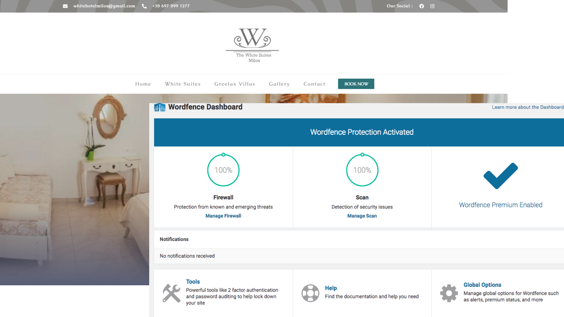 cut image of a security dashboard with its corresponding hotel in the background